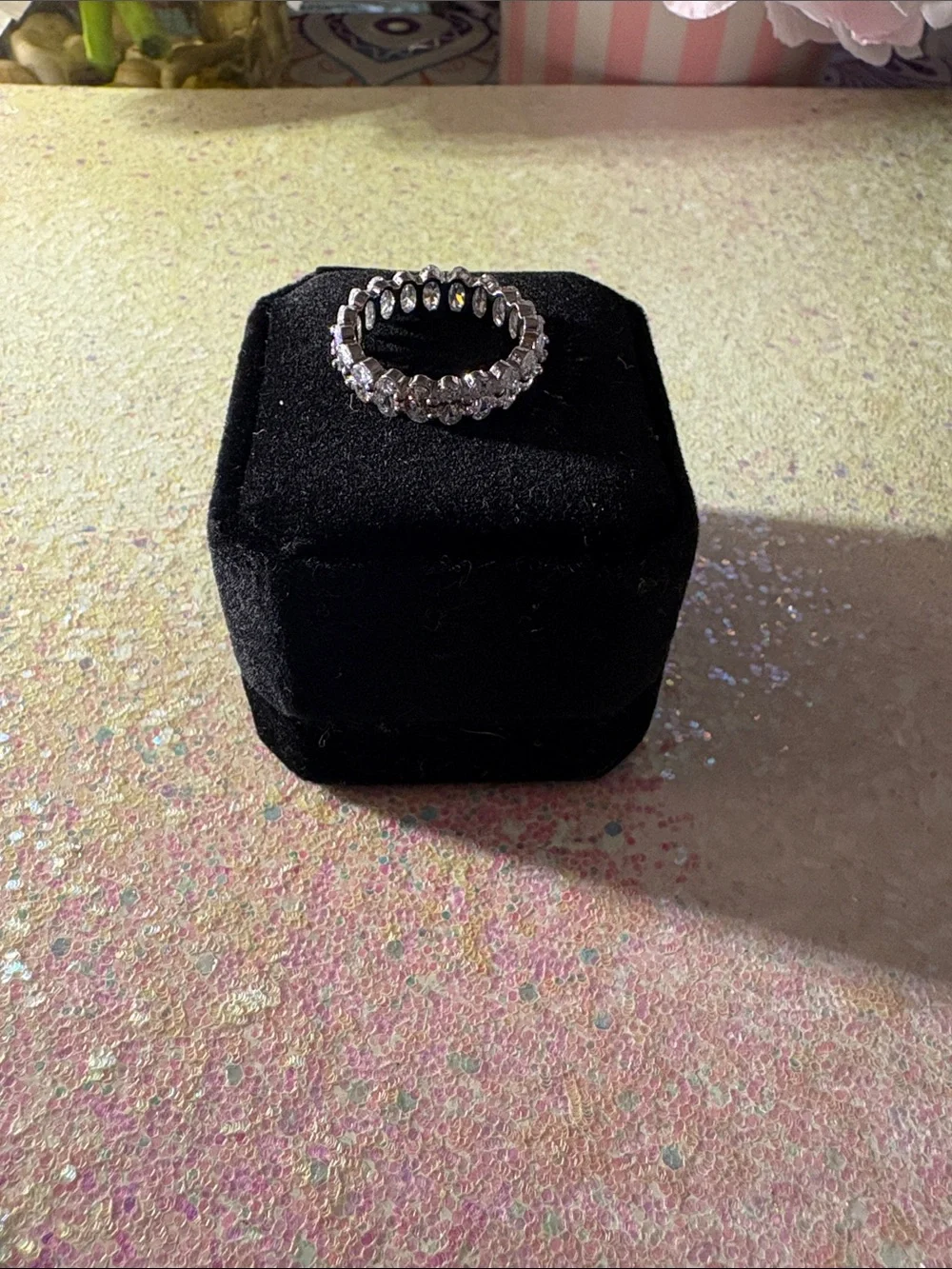 Classic Rhodium Cubic Zirconia Halo Eternity Band oval cut.